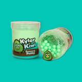 A jar of green and teal sensory putty named Jyler Kiwi with a jar laid on its side next to it showing green floam balls, clay sprinkles and a kiwi charm