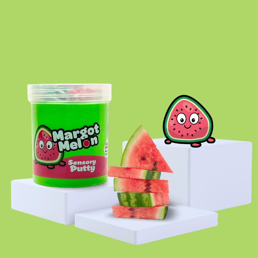 Green sensory putty on a plinth, collectable charm Margot Melon to the side, with some watermelon showcasing the scent