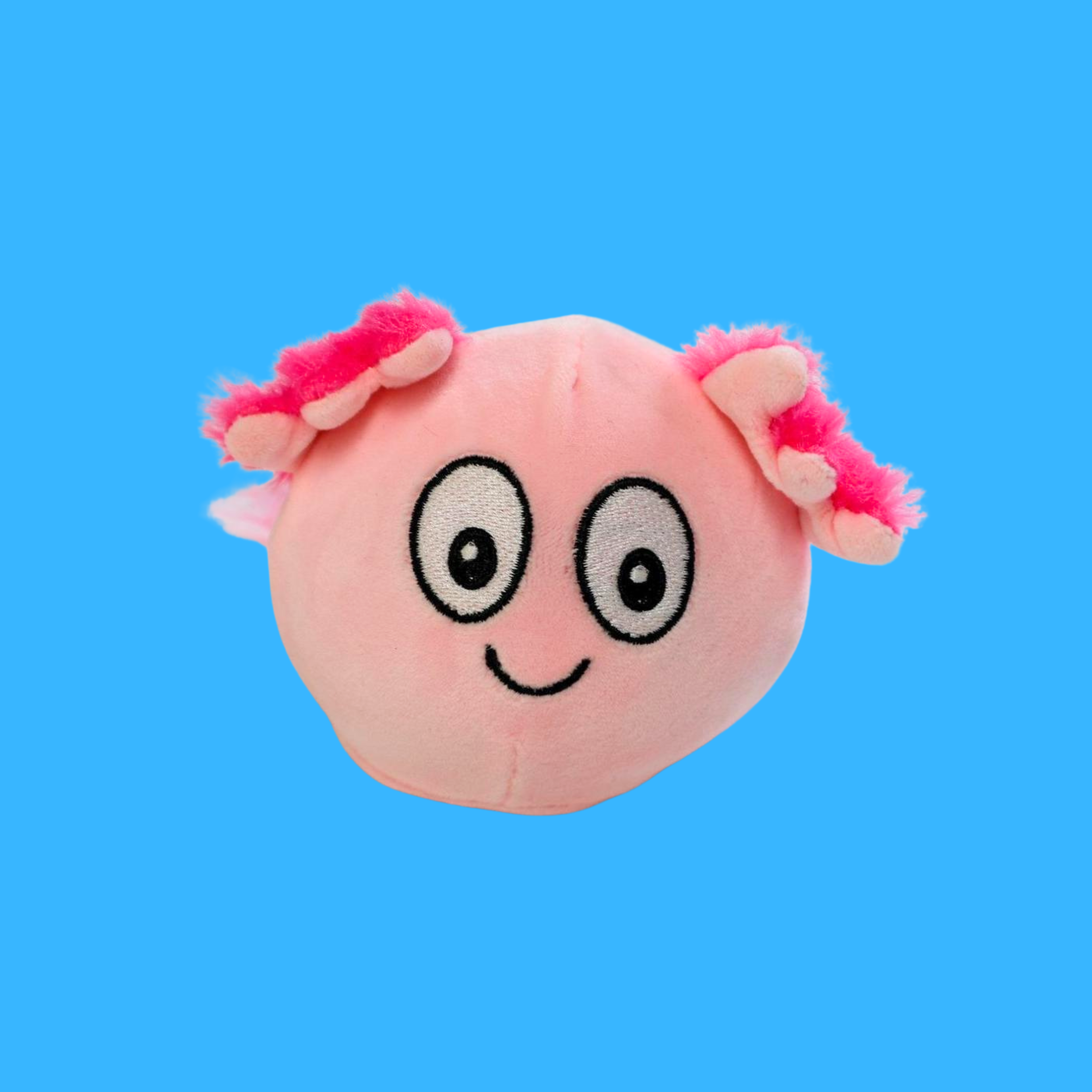 Blue background with a pink axolotl sugar ball, it has a smiley face and pink fluffy ears